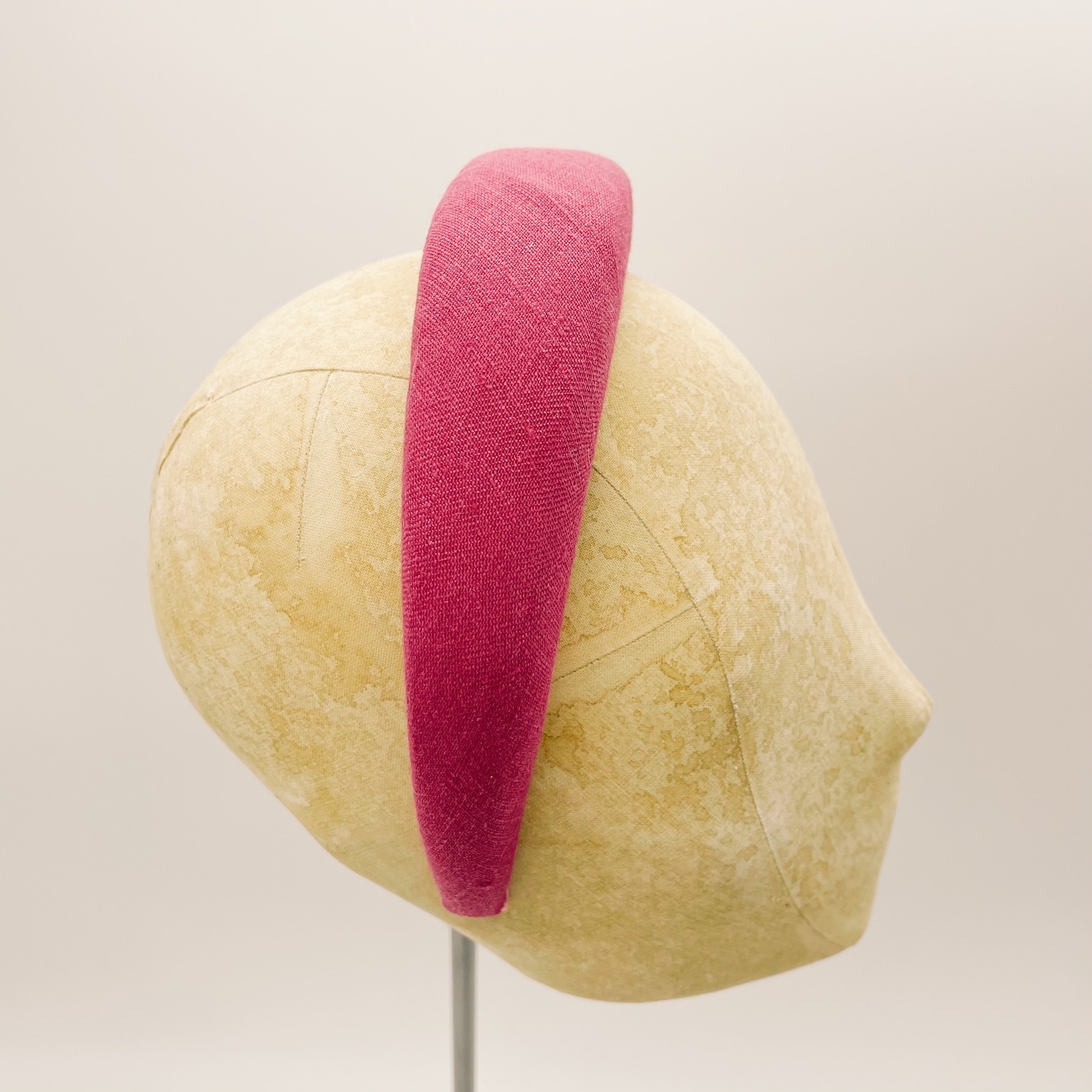 Serre-tête en lin rembourré fuchsia